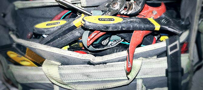 disorganized plumbing tool kit